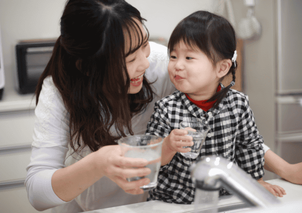 Child and practitioner drinking water